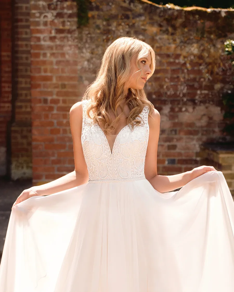 Phoenix Gowns beaded V-neck A-line wedding dress with flowing chiffon skirt - designer bridal gowns at Wife To Be, Chester & Cheshire